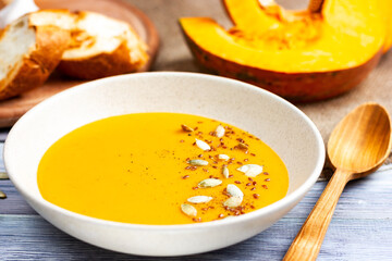 Fitness food. Diet cream soup with pumpkin seeds. Autumn breakfast.