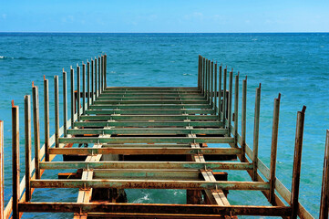 ruined pier on Mediterranean sea