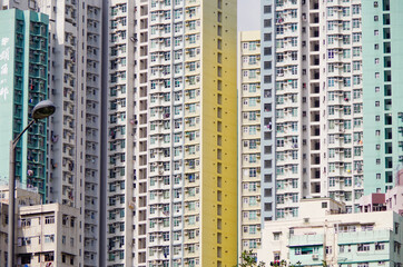 Residential area in old apartment with windows. High-rise building, skyscraper with windows of...