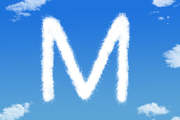 Letter M cloud shape on blue sky