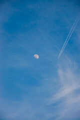 Passenger plane passes near the moon. Explore new frontier. Space traveler