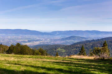 Fototapeta na wymiar Zywiec Basin (Valley) landscape in Beskid Mountains, Poland, with green forests, meadows and Zywiec Lake, Zar mountain, seen from the hill in Milowka, Poland.