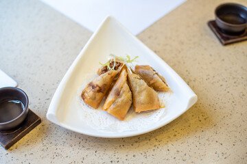 Chinese Cantonese-style morning tea and fried chicken spring rolls