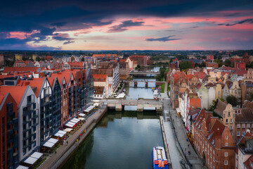 Fototapeta na wymiar Aerial view of the Gdansk city over Motlawa river with amazing architecture at sunset, Poland