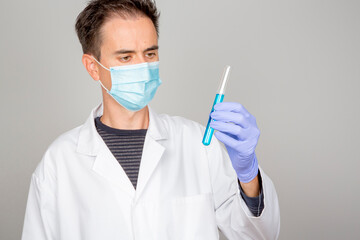 doctor in laboratory investigating covid 19 coronavirus vaccine