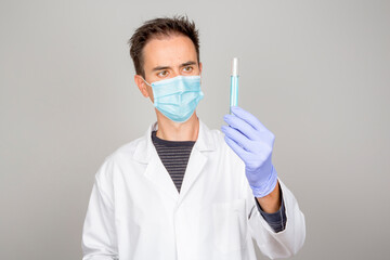 doctor in laboratory investigating covid 19 coronavirus vaccine