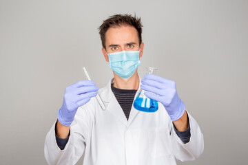 doctor in laboratory investigating covid 19 coronavirus vaccine