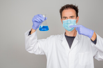 doctor in laboratory investigating covid 19 coronavirus vaccine