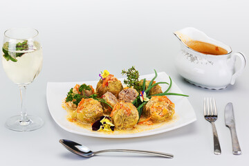 delicious and beautiful dish of cabbage rolls with meat and tomato sauce