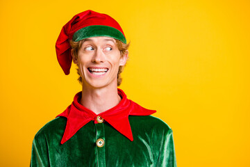 Close-up portrait of his he nice attractive cheerful cheery glad funny guy elf looking aside copy...