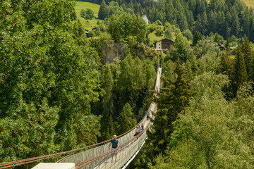 Tibetan suspended bridge near Niederwald on the Swiss alps