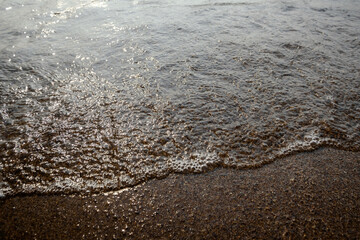 The bubble wave on the sand.