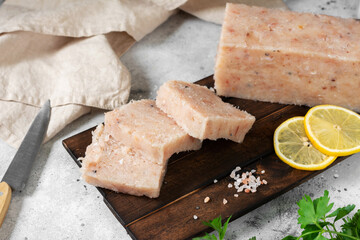 Raw minced fish. Minced fish on the kitchen Board on the light gray table	