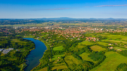 Green hilly landscape and small town