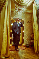 Fototapeta premium wealthy man in elegant suit