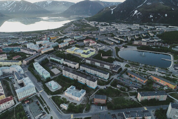 Fototapeta premium Aerial Townscape of Kirovsk Town located in Northwestern Russia on the Kola Peninsula