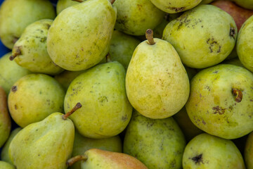 Organic market fresh Pears on an agricultural market at the mediterranean region in Turkey.