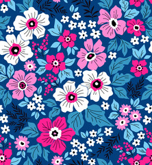 Trendy seamless vector floral pattern. Endless print made of small white and pink flowers. Summer and spring motifs. Blue background. Vector illustration.
