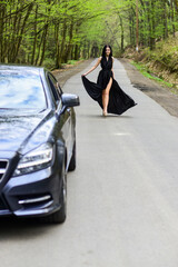 Status and respect. Rich people lifestyle. Start journey. Luxury car. Auto and pretty sexy woman at road. Travel concept. Traveling and vacation. Transport concept. Travel by car. Auto service