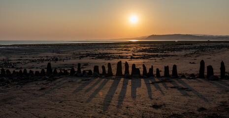 Fototapeta premium Wooden Groynes at sunrise