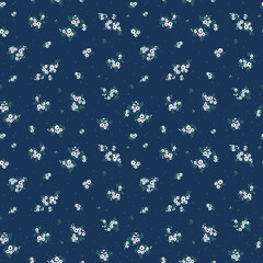 Seamless floral pattern for design. Small white flowers.  Navy  blue background. Modern floral pattern. elegant template for fashion prints.