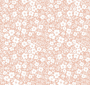 Vector seamless pattern. Pretty pattern in small flowers. Small white flowers. light beige background. Ditsy floral background. The elegant the template for fashion prints.