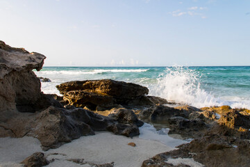 Strolling through Rompeaolas on the beach of Illetes (Formentera-Spain)