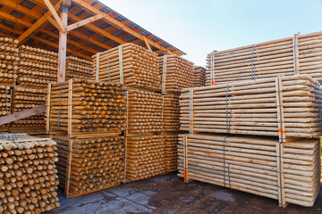 Piles of wooden boards in the sawmill, planking.