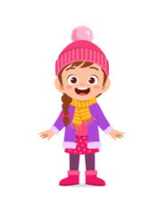 happy cute little kid play and wear jacket in winter season. child smile wearing warm clothes