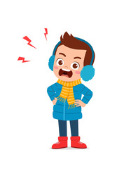 angry cute little kid scream and wear jacket in winter season. child shout wearing warm clothes