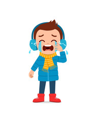 sad cute little kid cry and wear jacket in winter season. child scream crying wearing warm clothes