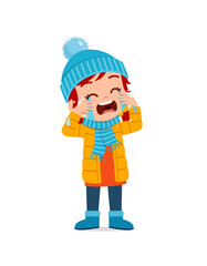 sad cute little kid cry and wear jacket in winter season. child scream crying wearing warm clothes