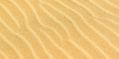 Fototapeta na wymiar Texture or pattern of golden sand 