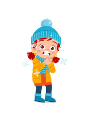 happy cute little kid play and wear jacket in winter season. child feeling chill wearing warm clothes