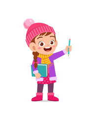 happy cute little kid study and wear jacket in winter season. child read book wearing warm clothes