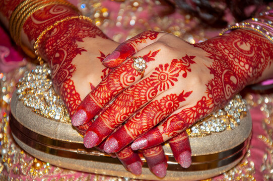 Henna tattoos on the bride hands  