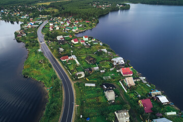 Aerial Townscape of Suburban Village Fedoseevka located in Kandalaksha Area in Northwestern Russia...