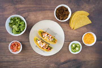 Crunchy Beef Tacos on a Wooden Table