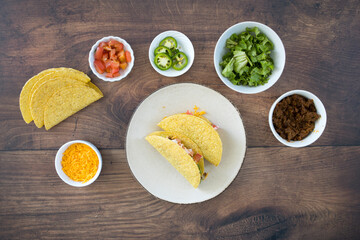 Crunchy Beef Tacos on a Wooden Table