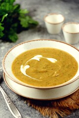 Cream soup made from zucchini, eggplant, potatoes, carrots, tomato and cilantro. 