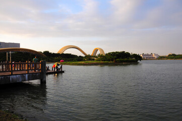 Naklejka premium People fishing in evening, Yingxi Lake, Taiwan.