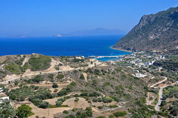 Obraz premium Beautiful view from the height of the sea Bay mountains and resort town on the shore