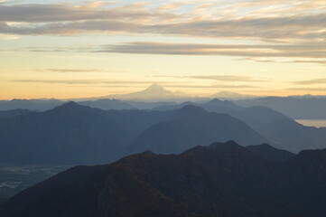 Mountain climbing during the sunrise on the snow covered active Volcan Villarrica in Pucon, Chile