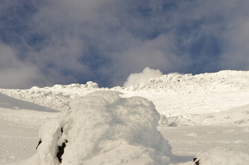 Mountain climbing during the sunrise on the snow covered active Volcan Villarrica in Pucon, Chile