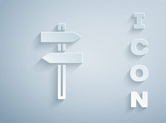 Paper cut Road traffic sign. Signpost icon isolated on grey background. Pointer symbol. Street information sign. Direction sign. Paper art style. Vector.