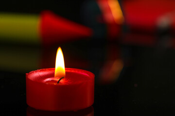 Diwali Diya with Fire Crackers over rangoli background