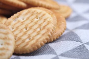 homemade biscuits on table cloth close up 