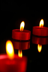 Indian festival diwali , candle on dark background
