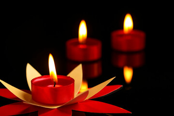 Indian festival diwali , candle on dark background