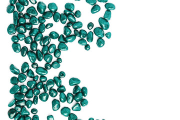 frame of stones in the form of pebbles painted in green on a white background. flat layout, space for text